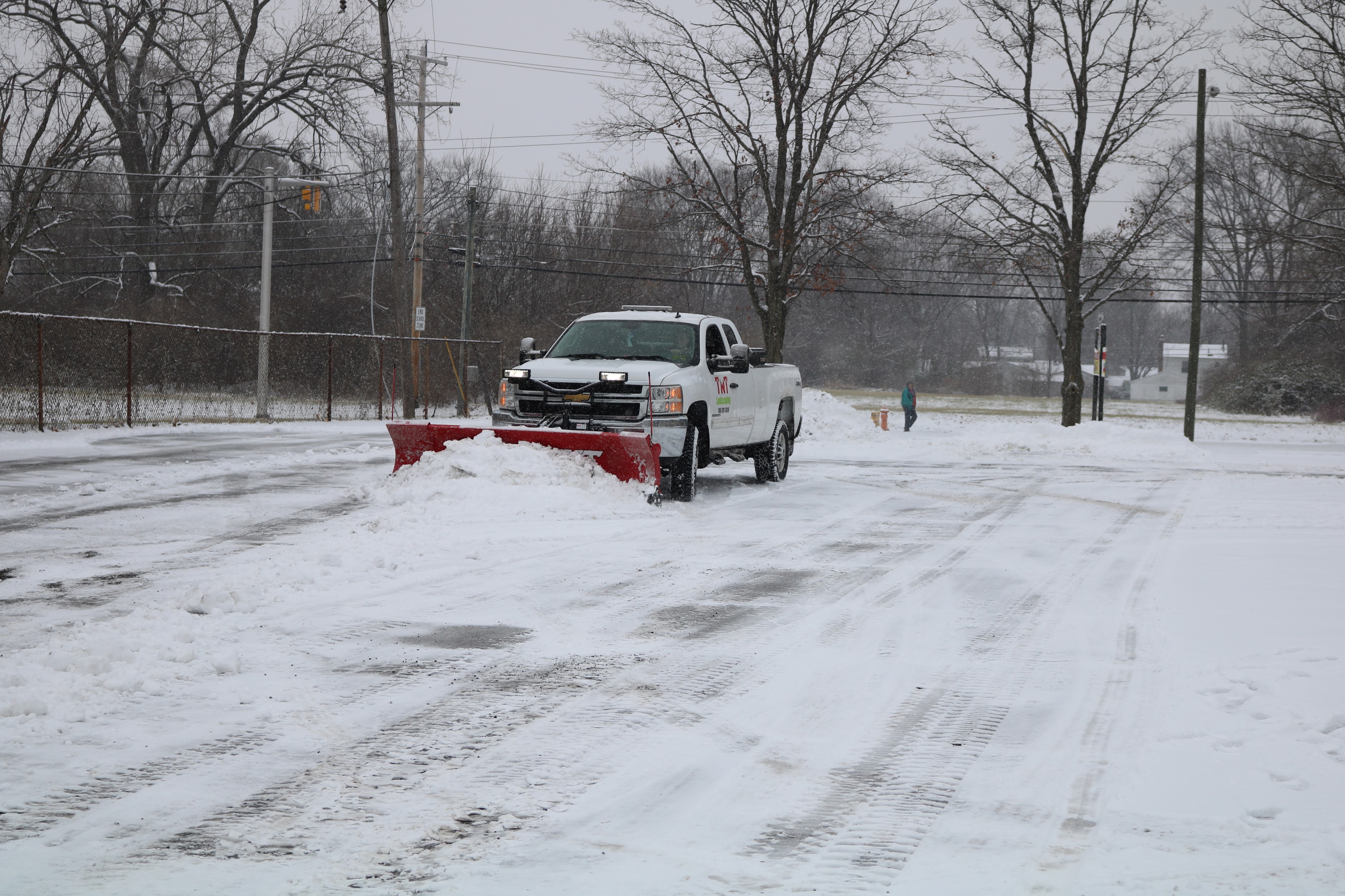 Commercial snow plowing and de-icing services